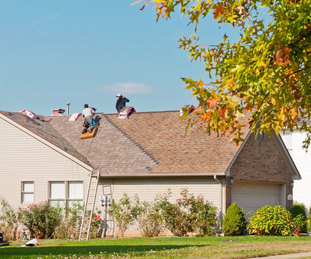 Roofing contractors in Longview WA installing a new roof.