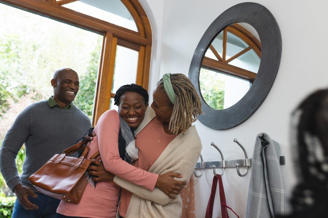 A happy couple entering their new construction home near Longview WA after contacting new home builders in Longview.